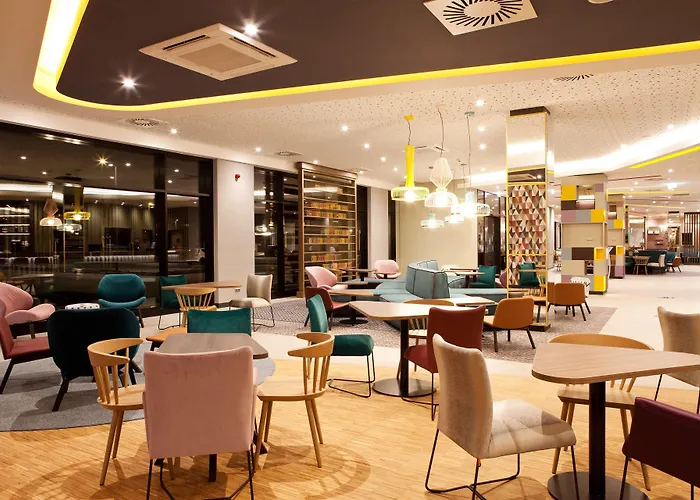 ホテル Hampton By Hilton Munich Airport South 3*
