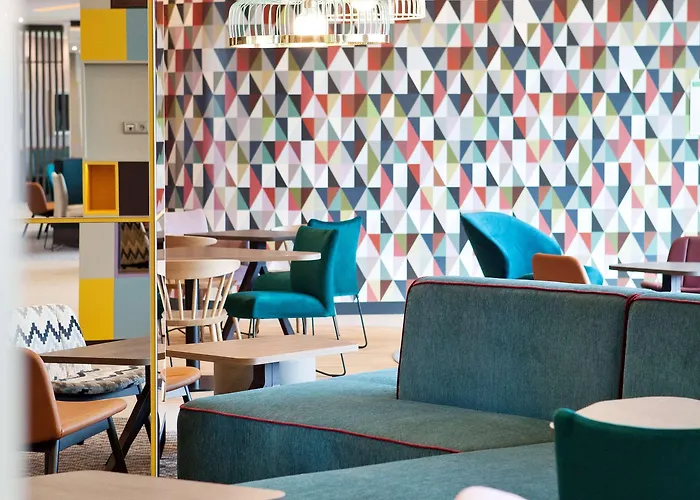 ホテル Hampton By Hilton Munich Airport South 3*