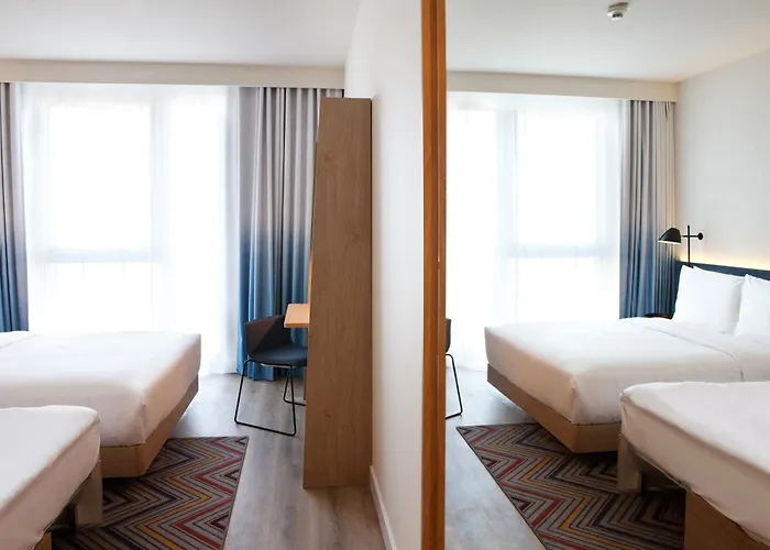 Отель Hampton By Hilton Munich Airport South Халльбергмос