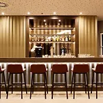 Hampton By Hilton Munich Airport South Hotell 3*